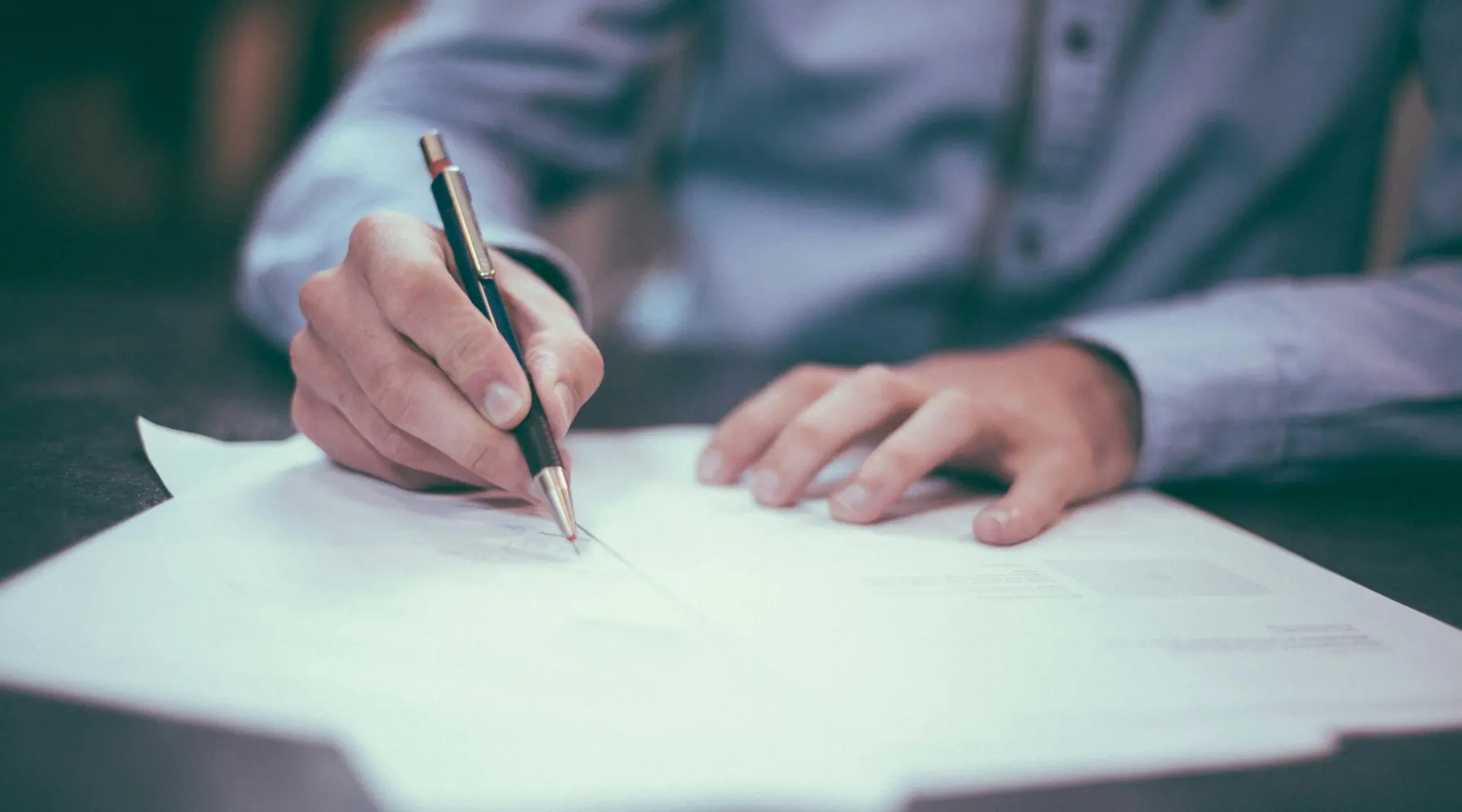 Signing an agreement with a fountain pen